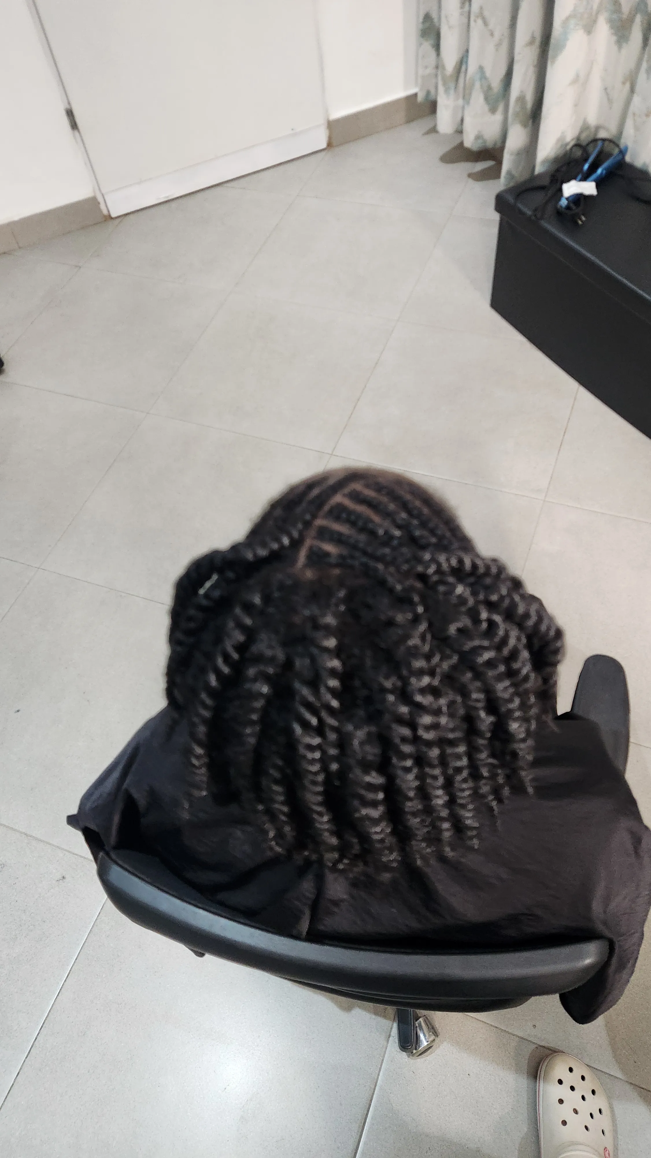 Protective braided rows styled with clean sectioning by Ash Hair Story.
